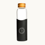 Bamboo Lid Glass Water Bottle in black, showing logo placement