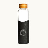 Bamboo Lid Glass Water Bottle in black, showing logo placement