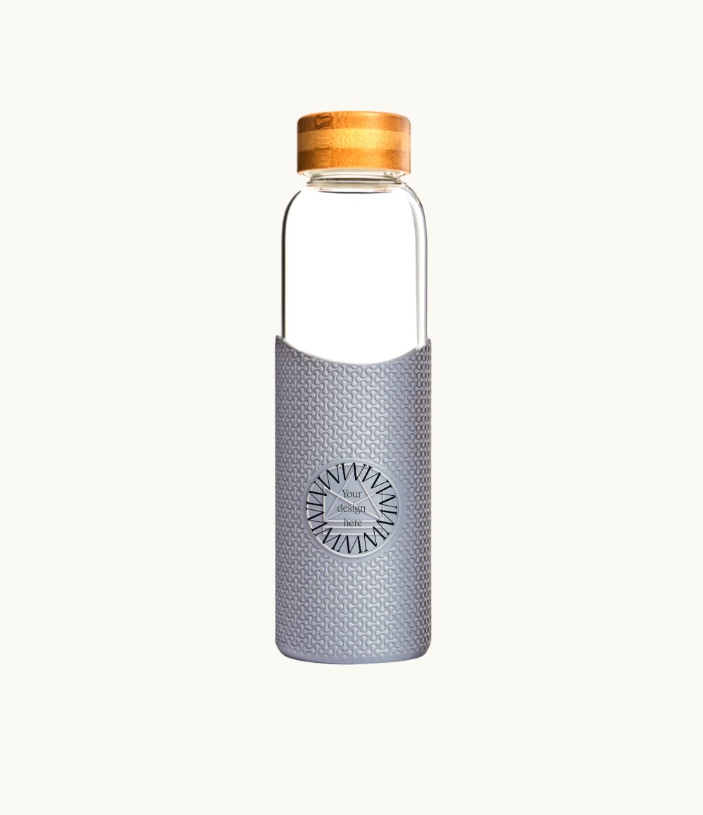 Reusable glass water bottle with grey silicone sleeve and bamboo lid, branded corporate gift for meeting rooms and offsites