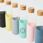 Bamboo Lid Glass Water Bottle, all colours together, showing logo placement