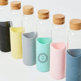 Bamboo Lid Glass Water Bottle, all colours together, showing logo placement