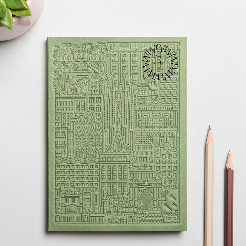 Debossed Barcelona notebook in green. Corporate gifts from women-owned brands.
