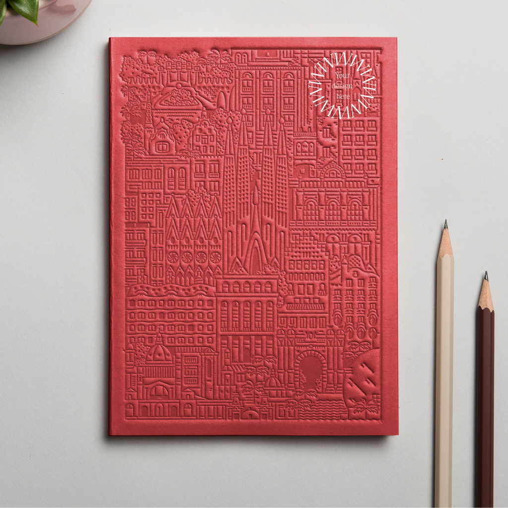 Debossed Barcelona notebook in red. Sustainable branded notebook from women-owned brands.