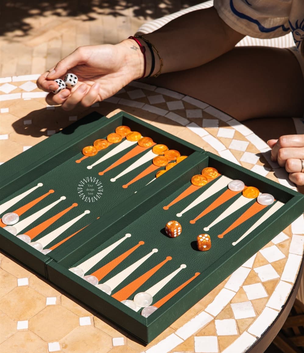 Green leather backgammon booklet in use, executive corporate gift for board members and private dinners