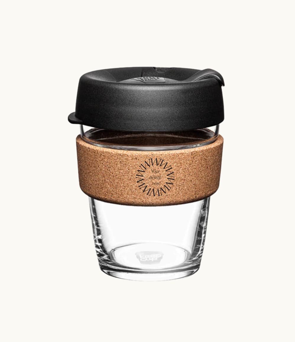 12oz reusable glass cup with a natural cork band, black lid, showing logo placement on the cork band, personalised for employee gifting and conferences