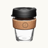 12oz reusable glass cup with a natural cork band, black lid, showing logo placement on the cork band, personalised for employee gifting and conferences