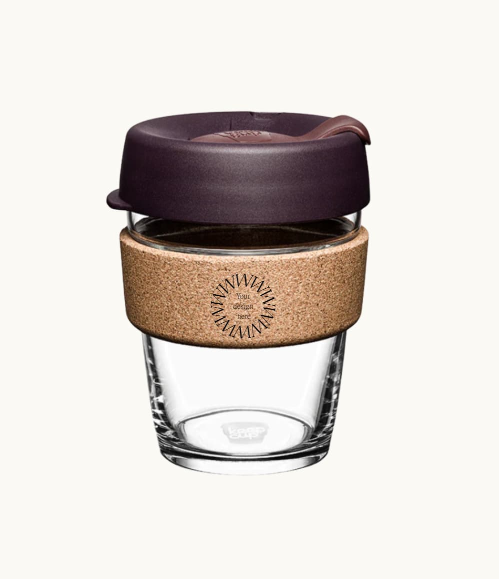 12oz reusable glass cup with a natural cork band, burgundy lid, showing logo placement on the cork band