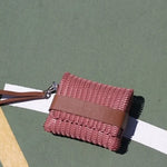 Upcycled vegan wrist bag
