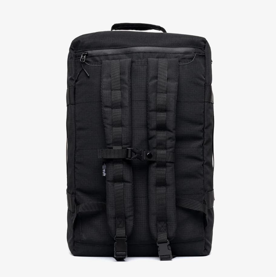 Cabin Backpack 30L in black, showing the back and straps