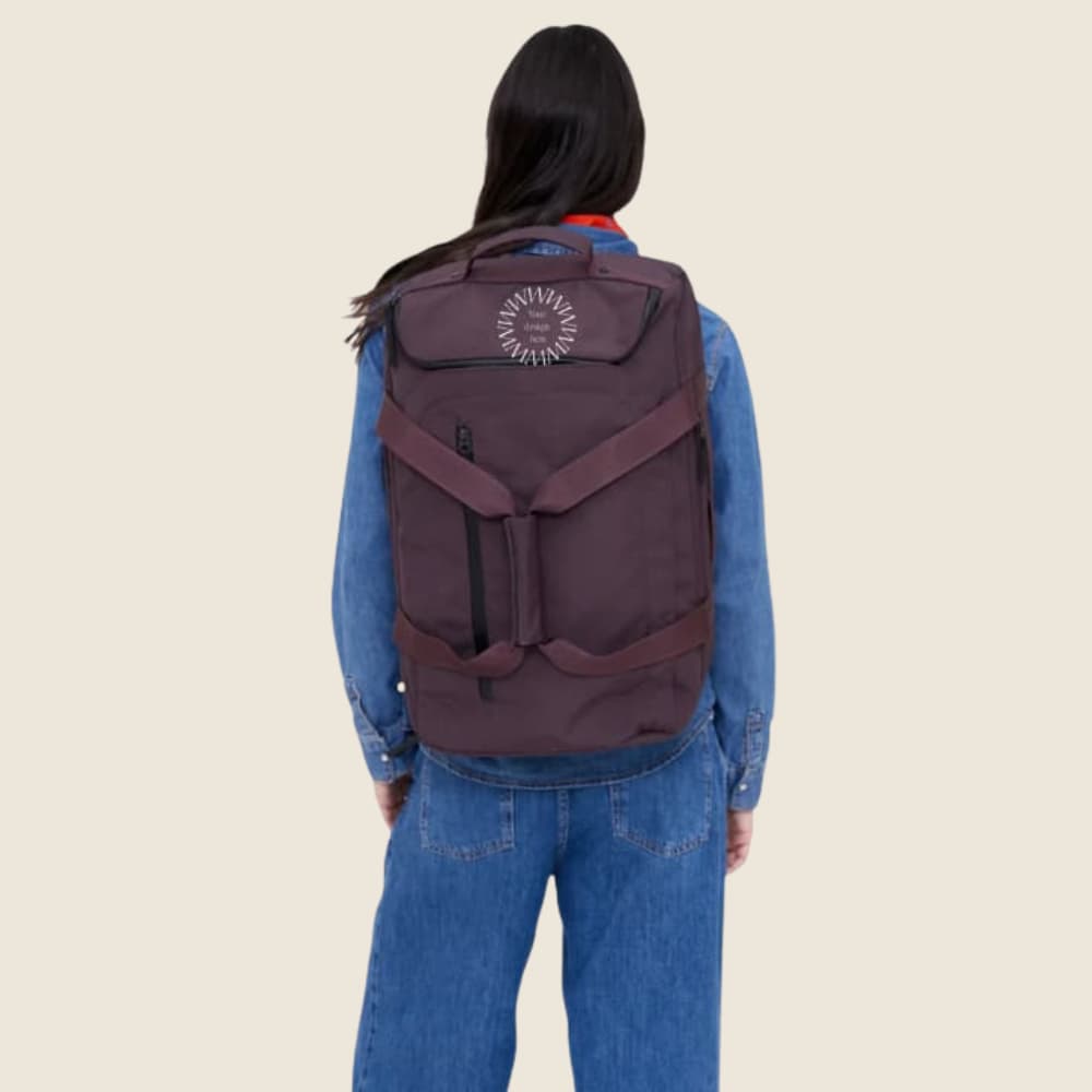 Cabin Backpack 30L in maroon, worn