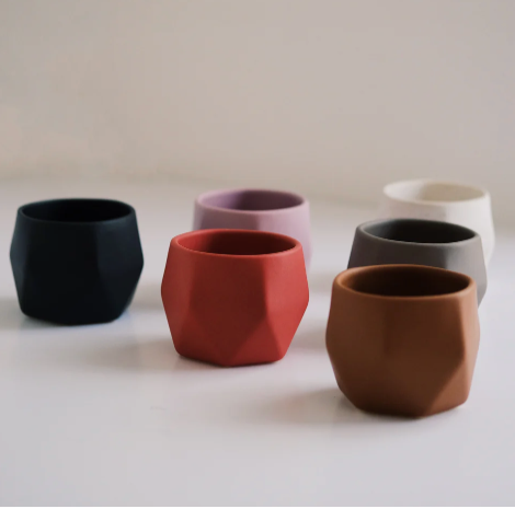 Handmade ceramic coffee cup set of 2, natural contours and vibrant colours. Unique corporate gifting idea.