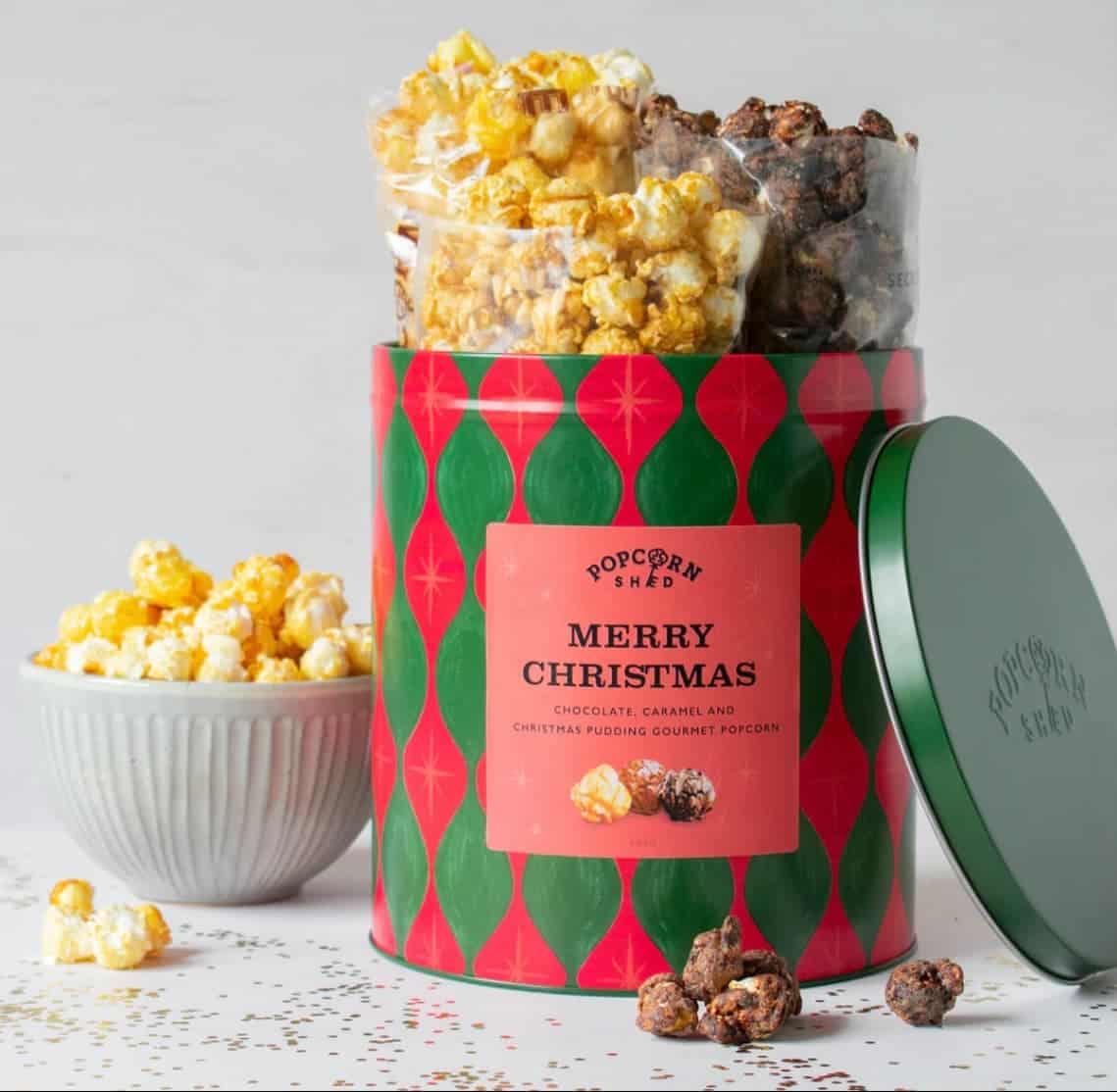 Christmas Popcorn Gift Tin, Merry Christmas label, chocolate, caramel and Christmas pudding gourmet popcorn, open