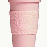 Pink compostable 16oz tumbler with lid, co-brand for sustainable merch and eco swag from women-owned brands