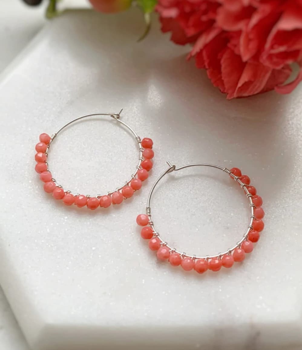 Handcrafted coral beaded hoop earrings, a unique corporate gift for women, ideal for International Women's Day