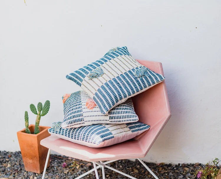 Handwoven cotton cushion cover styled on sofa, event styling and brand activation for corporate events