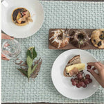 Handwoven organic cotton table runner styled in setting, corporate event styling and brand activation.