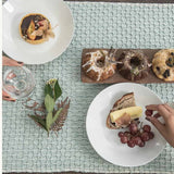 Handwoven organic cotton table runner styled in setting, corporate event styling and brand activation.