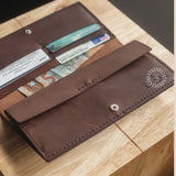Hand-stitched long leather wallet, a personalised corporate hospitality gift for clients.
