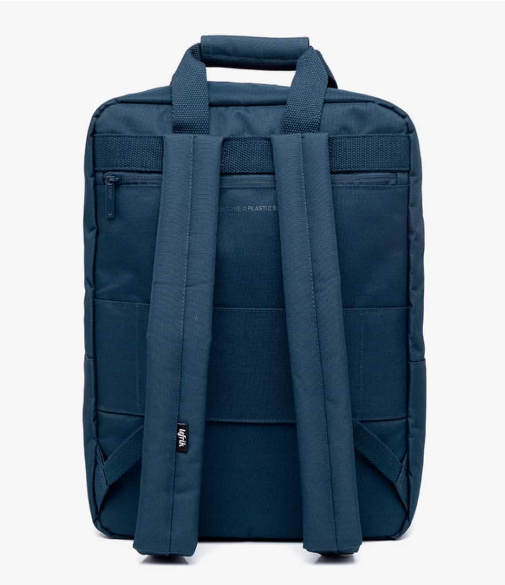 Daily 15" Backpack shown from the back, featuring padded shoulder straps, a top carry handle, and multiple zippered pockets, photographed against a plain white background.