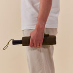 Eco-friendly travel umbrella in Dark Olive for sustainable corporate gifting from women-owned brands 
