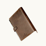 Fairtrade leather journal cover hand stitched women artisans premium corporate gift