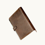 Fairtrade leather journal cover hand stitched women artisans premium corporate gift