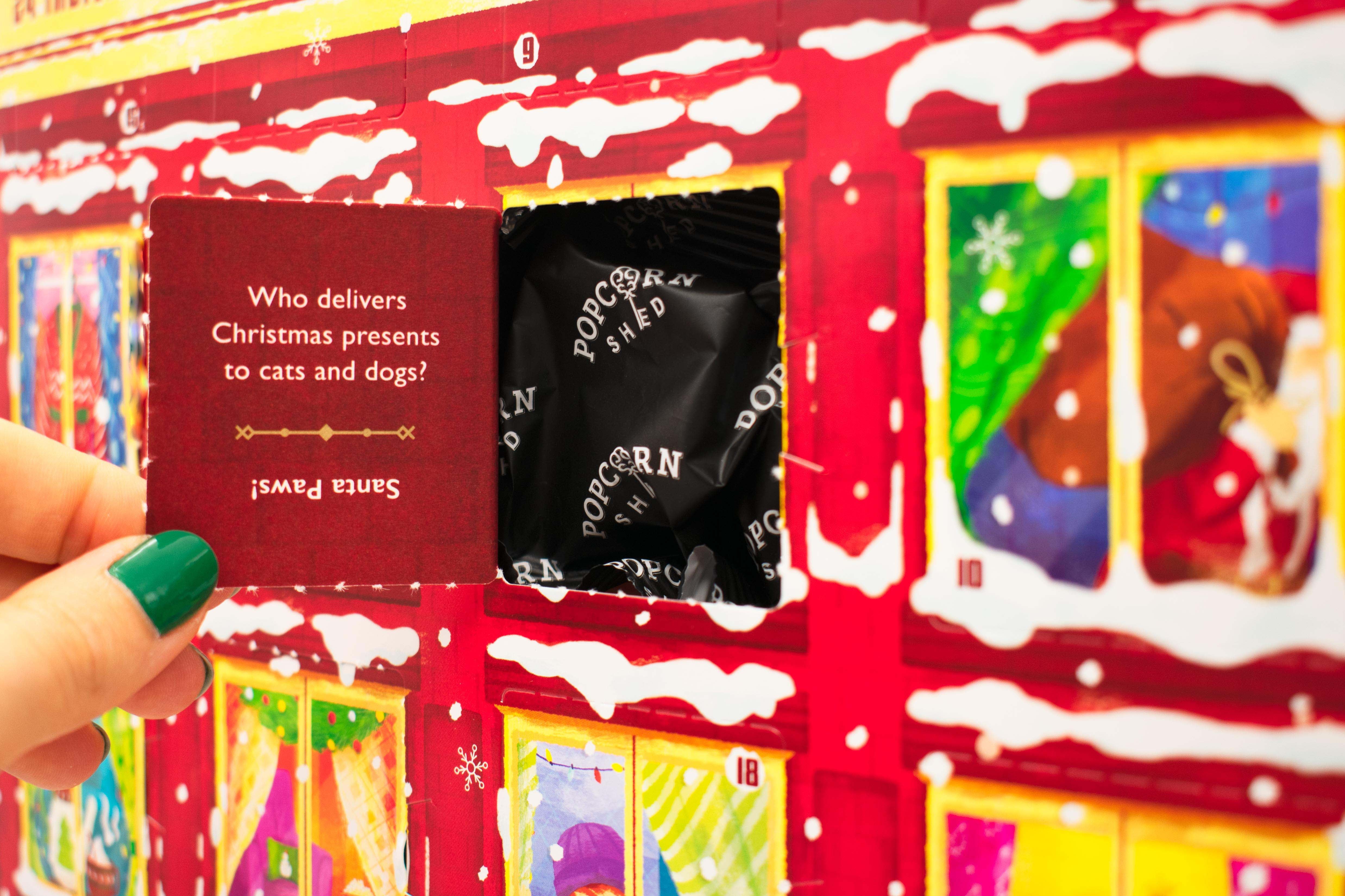 Detail of red popcorn advent calendar. Gifts for employees and clients