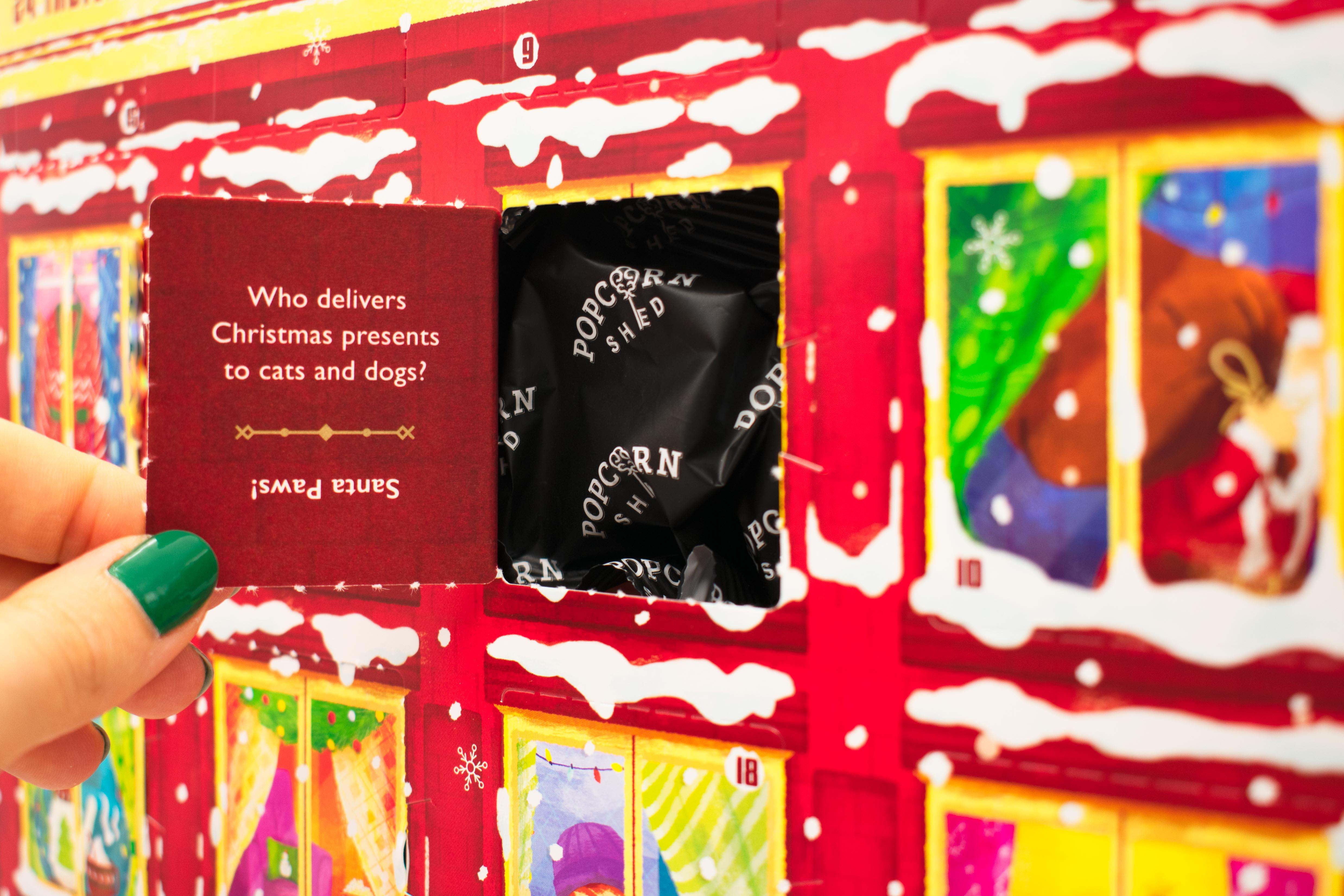 Detail of red popcorn advent calendar. Gifts for employees and clients