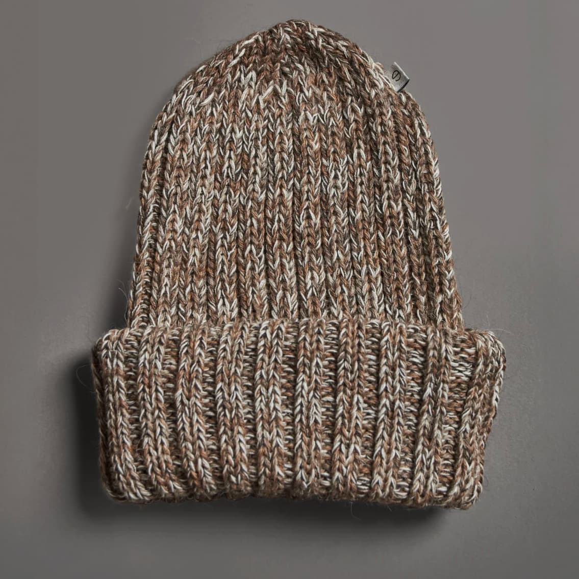Premium wool fisherman beanie personalised for corporate gifting and event swag