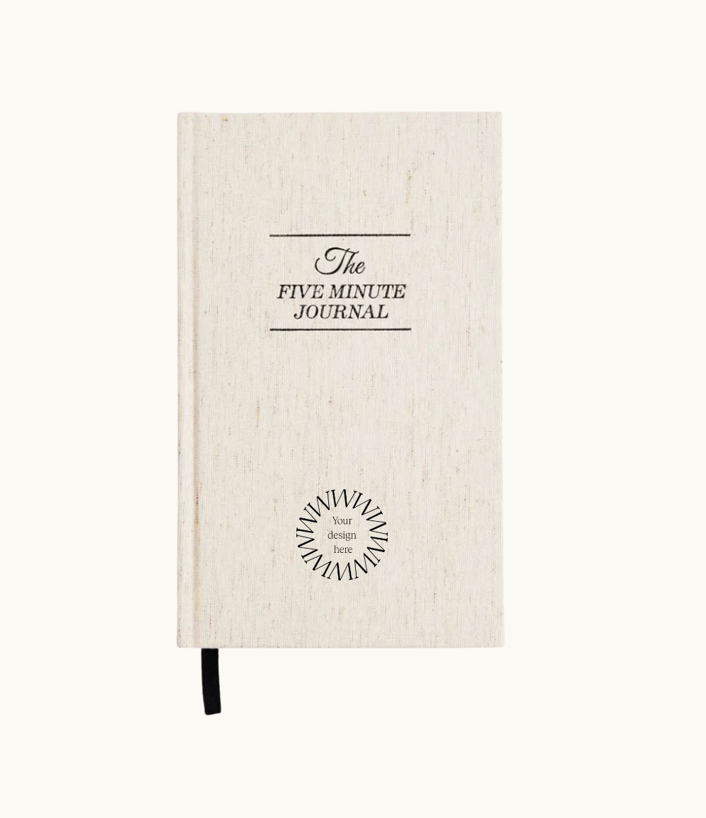 The Five Minute Wellness Journal in an oat linen cover, a thoughtful corporate gift idea for women employees from women-owned brands.