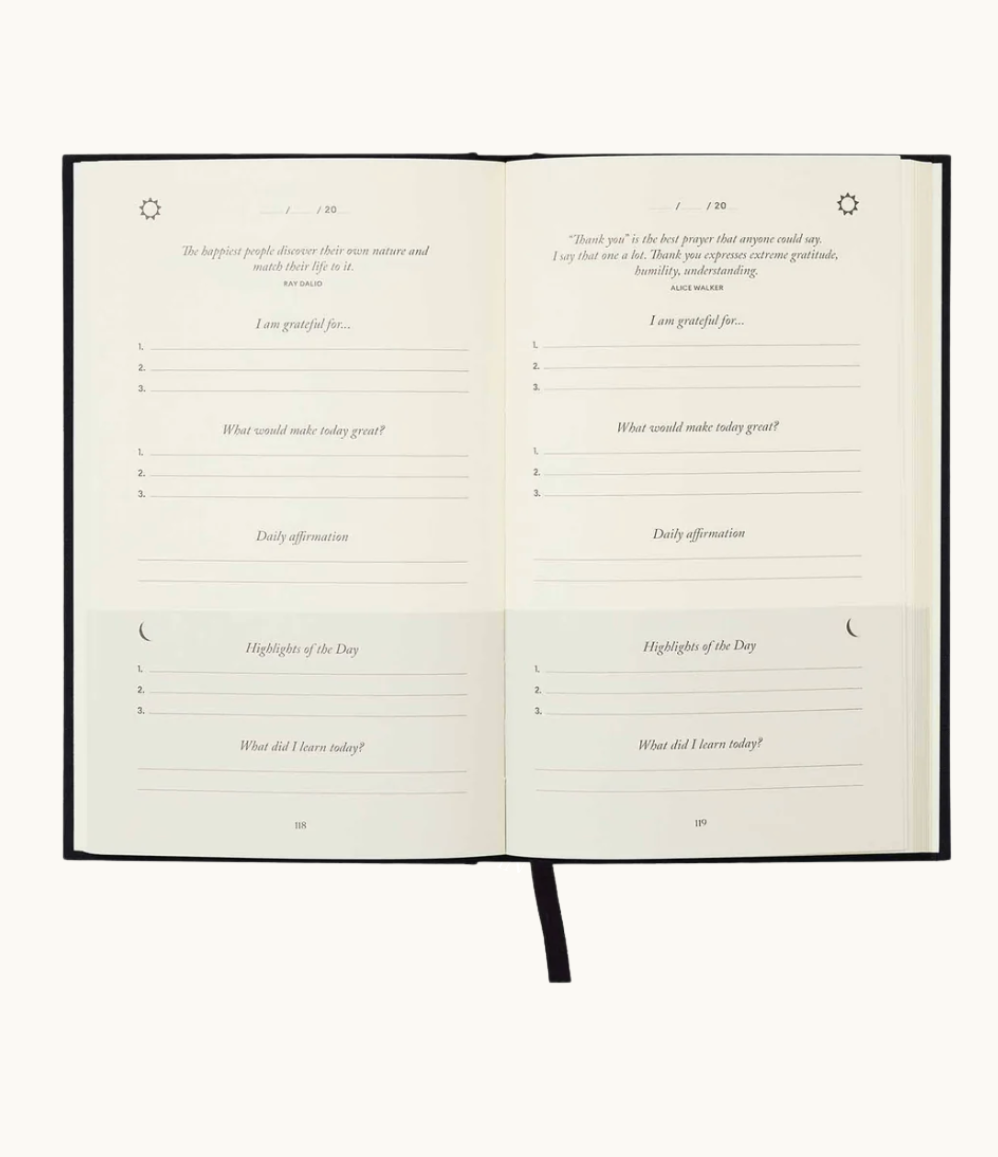Inside pages of the Five Minute Journal showing daily gratitude prompts and reflections, designed to promote positivity and well-being. Personalised corporate gifts