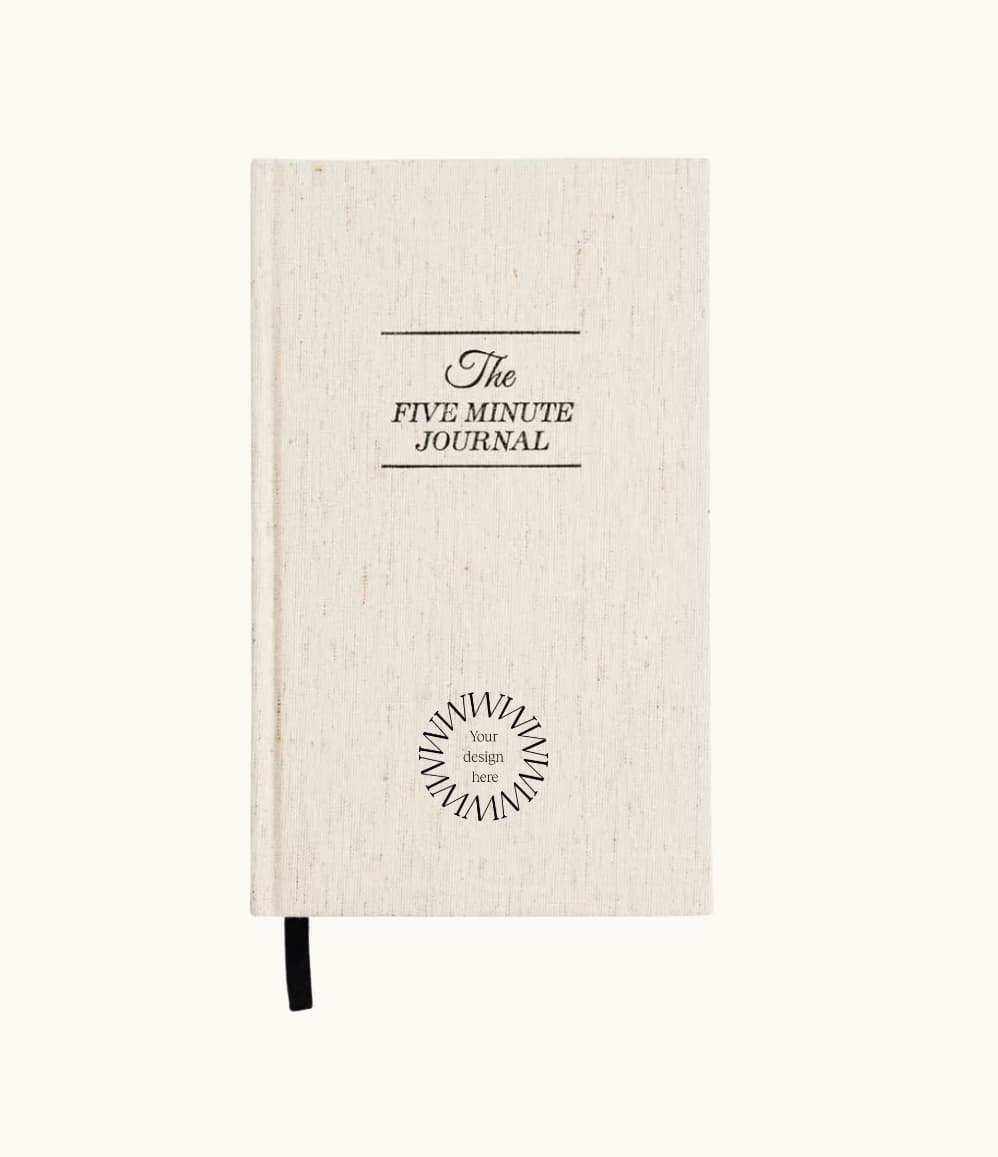 The Five Minute Journal, front cover in oat, showing logo placement