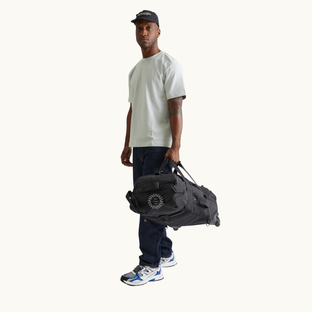 Foldable Travel Bag with Wheels in Black lifestyle view, recycled PET sustainable premium merch, water resistant