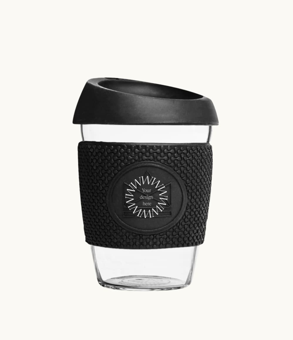 Glass Coffee Cup 12oz in black, with a silicone thermal sleeve, showing logo placement