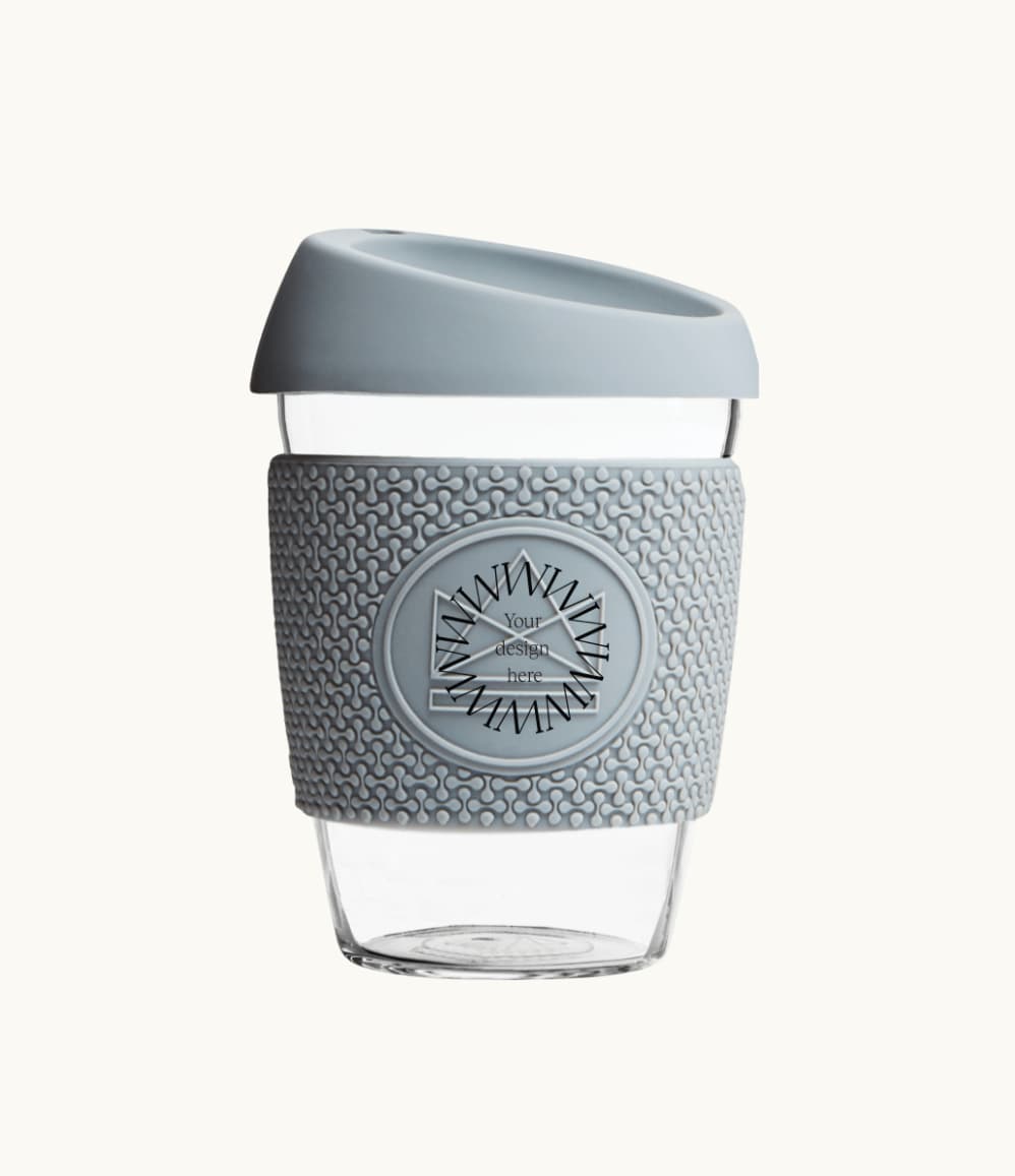 Glass Coffee Cup 12oz in grey, with a silicone thermal sleeve, showing logo placement