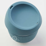 Glass Coffee Cup 8oz in blue, showing the lid opening where you drink