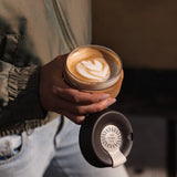 glass cup with cork band sustainable branded merchandise for events and employee gifting
