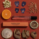Flor de Madera travel fragrance and hand cream from the Hand Cream + Travel Fragrance Set