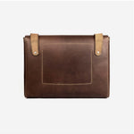 Hand-stitched full-grain leather laptop bag in tan, a sustainable corporate gift from women-owned brands
