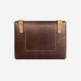 Hand-stitched full-grain leather laptop bag in tan, a sustainable corporate gift from women-owned brands
