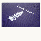 Launch Plan Hardcover Notebook, silver embossing detail on the cover.