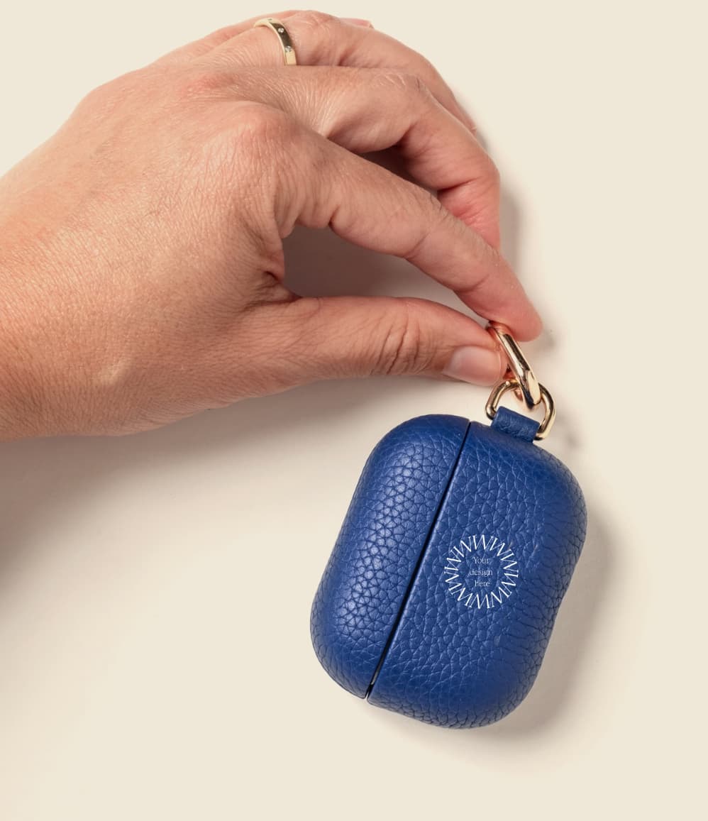Leather AirPods Case in blue with 'Your design here' message