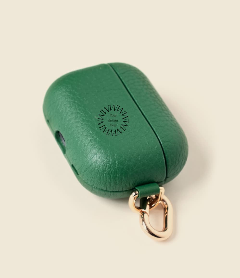 Leather AirPods Case in green with 'Your design here' message