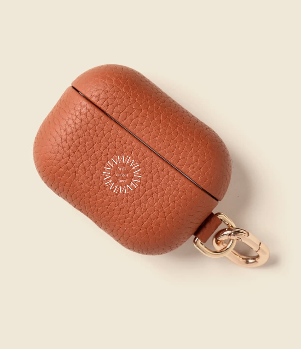 Leather AirPods Case in tan with 'Your design here' message