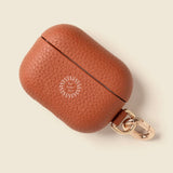 Leather AirPods Case in tan with 'Your design here' message