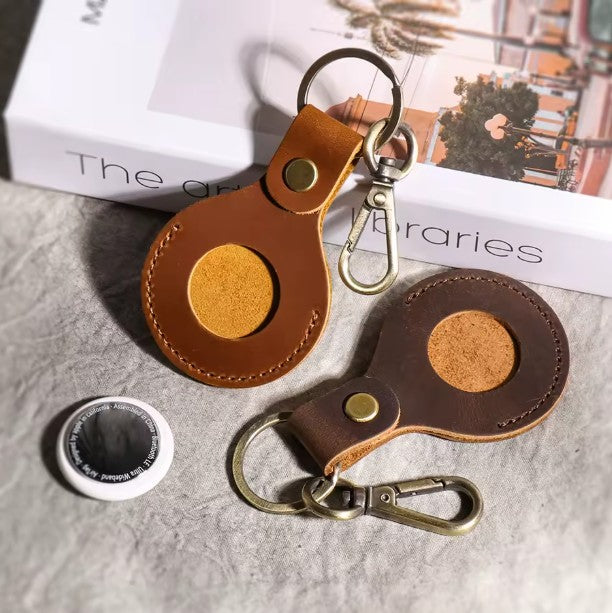 Leather AirTag holder attached to key holder, made from repurposed leather