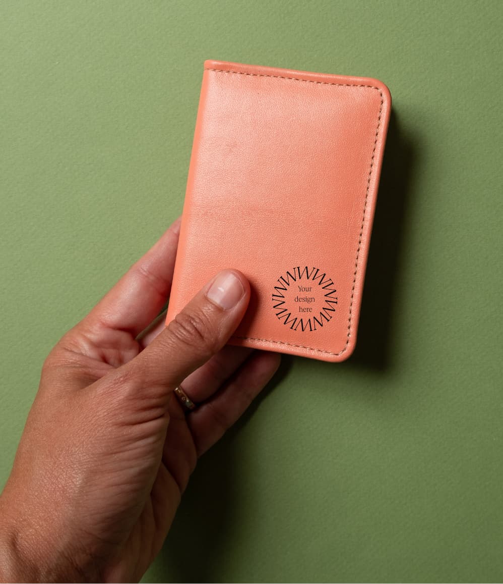 Leather Bifold RFID Wallet in coral, showing logo placement