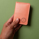 Leather Bifold RFID Wallet in coral, showing logo placement