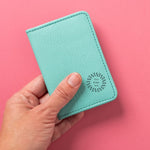 Leather Bifold RFID Wallet in light blue, showing logo placement