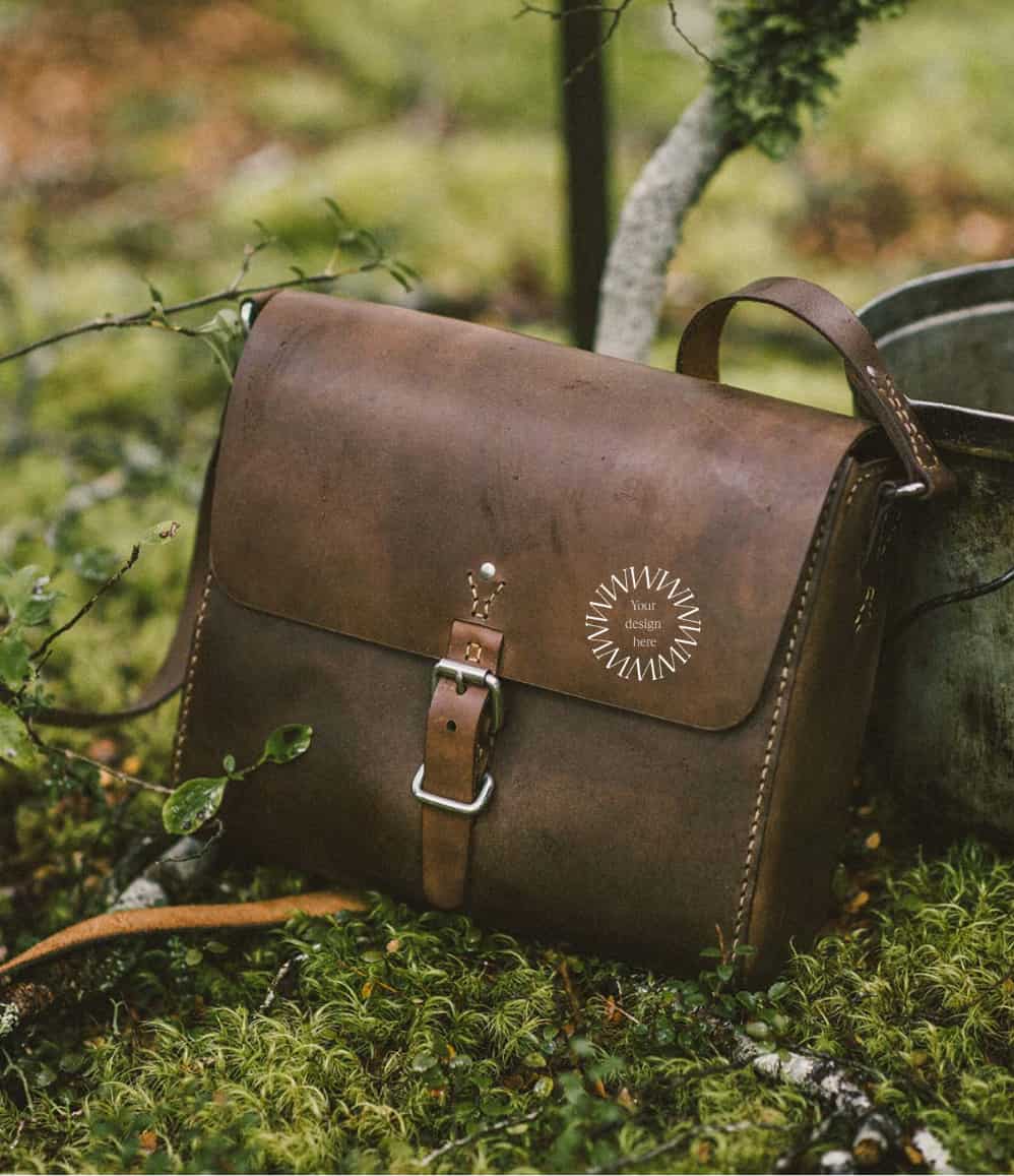 Hand-stitched leather crossbody bag in brown, a sustainable corporate gift from women-owned brands